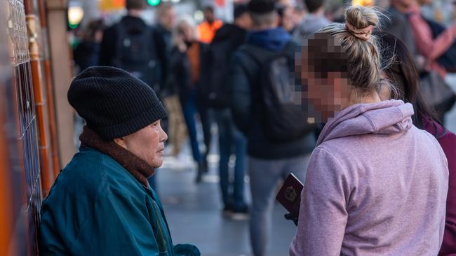 One of the beggars outside the Young and Jackson hotel on Flinders St. Picture: Jason Edwards