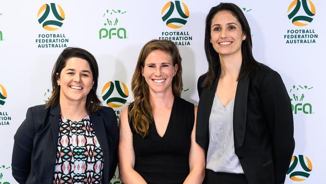 (l-r) FFA Head of Game Development Sarah Walsh, Matildas star and PFA Executive Committee Member Elise Kellond-Knight, and PFA Deputy Chief Executive Kathryn Gill at Wednesday’s announcement of the new Collective Bargaining Agreement (CBA) for the Socceroos and Matildas. Picture: AAP