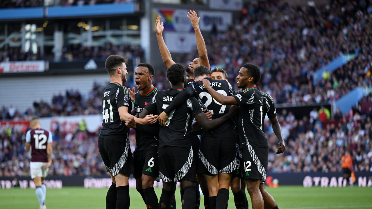 Leandro Trossard of Arsenal celebrates scoring his team's first goal with teammates during the Premier League match between Aston Villa FC and Arsenal FC at Villa Park on August 24, 2024 in Birmingham, England. (Photo by Shaun Botterill/Getty Images)