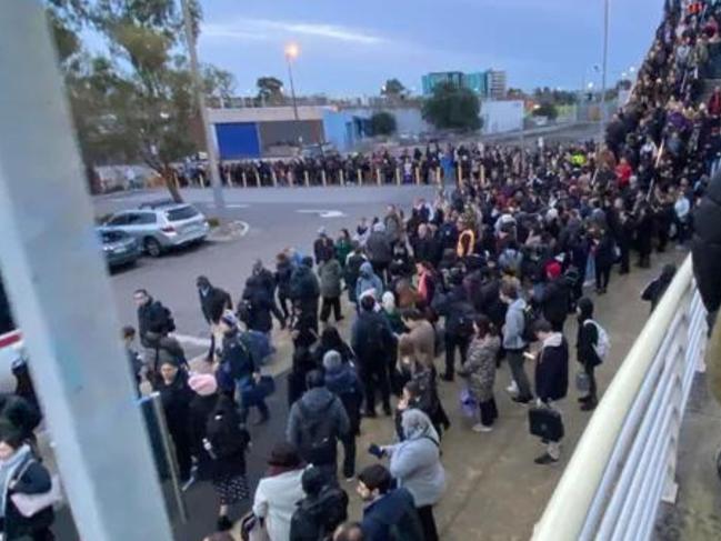 Commuters were left lining up for meters just to get on a replacement bus at Dandenong station. Picture: Reddit @currentlyontrain