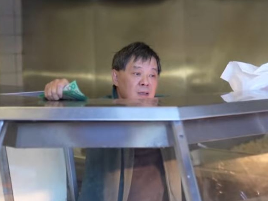 He can be seen in shock as the YouTube star leaves him with the hefty tip. Picture: YouTube/Spanian
