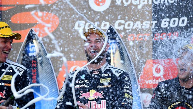 Shane van Gisbergen (centre) celebrates winning the 2019 Gold Coast 600. Picture: AAP/Dave Hunt