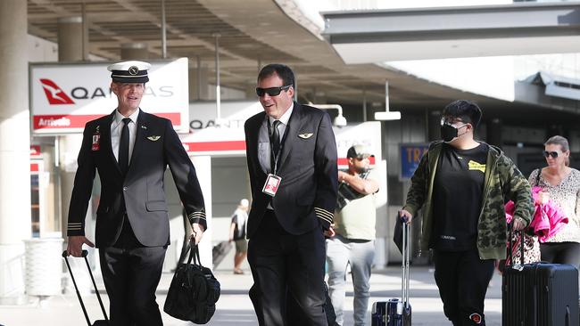 Qantas pilots and staff at Brisbane airport. Picture: Liam Kidston