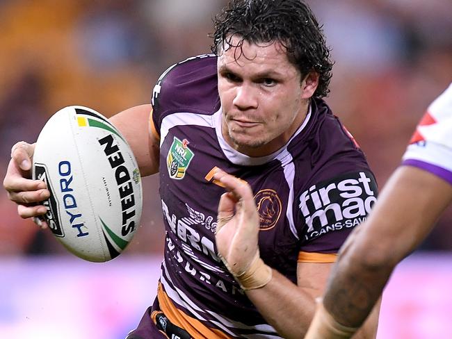 BRISBANE, AUSTRALIA - APRIL 20:  James Roberts of the Broncos takes on the defence during the round seven NRL match between the Brisbane Broncos and the Melbourne Storm at Suncorp Stadium on April 20, 2018 in Brisbane, Australia.  (Photo by Bradley Kanaris/Getty Images)