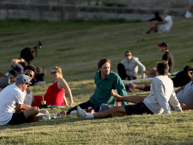 People flouting social distancing rules at Bondi Beach this week. Picture: Damian Shaw