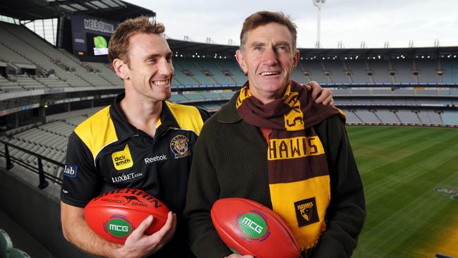 MCG Promotion 'Rite of Passage'. Hawthorn legend Michael Tuck with his son Richmond player Shane Tuck at the MCG in 2009.