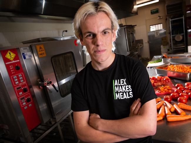 Alex Dekker was a full time uni student when COVID-19 hit and what started as him making meals for his sister, a doctor run off her feet during the pandemic, grew into a charity to now supplies up to 5000 meals a week to the needy. Picture: Tony Gough
