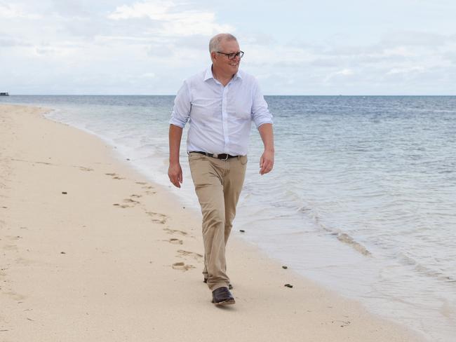 Prime Minister Scott Morrison on Green Island, off the coast of Cairns. The Prime Minister visited the Great Barrier Reef Marine Park off the coast of Cairns to announce $1 billion in funding over 9 years to promote health and conservation efforts for the reef. Picture: Brendan Radke