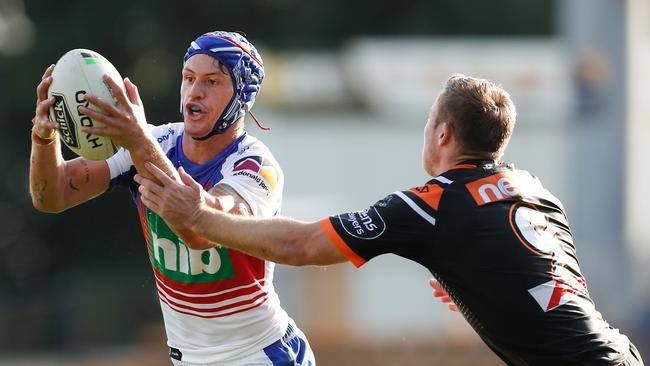 Kalyn Ponga runs the ball for the Knights against Wests Tigers. Picture: Brendon Thorne/AAP