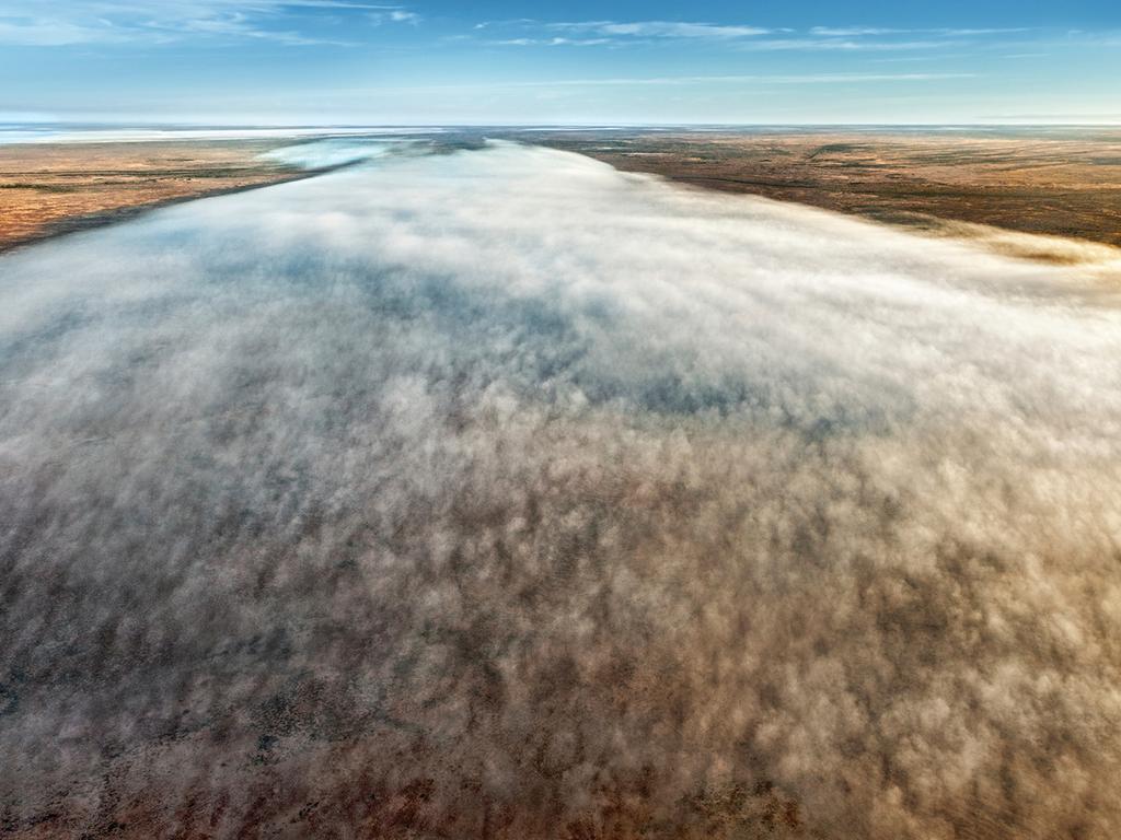 August: Fog covers the desert near Kati Thanda – Lake Eyre, South Australia. Photograph: Peter Elfes Photography. In 2012 much of Australia’s semi-arid interior was recharged by floodwaters from Queensland. Water in Kati Thanda – Lake Eyre, usually a salt pan, provided moisture for the fog in Peter Elfes’ photograph. ‘So much water in an area that normally doesn’t have it,’ he says, ‘creates weather situations that you don’t normally get to see.’