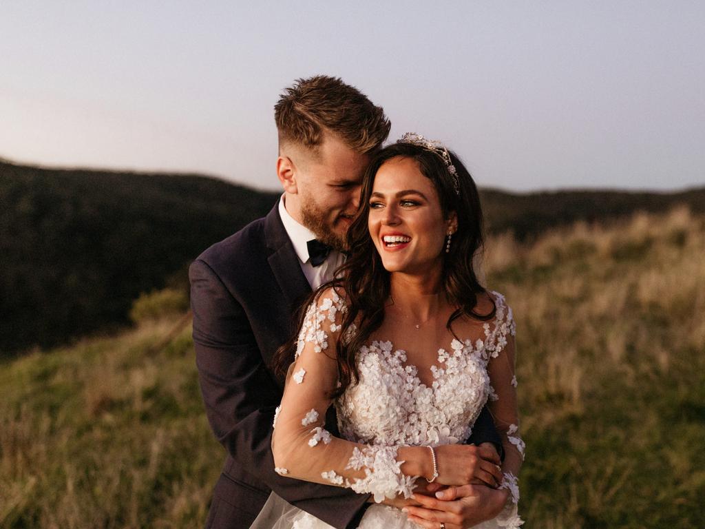 Felicity Leighton and Phillip Moss, married at Southland Church, Dan Evans Photography. Felicity and Phillip faced changing restrictions right up to their day, meaning they changed the guest list and venue last minute. The wedding ceremony was live streamed so all interstate and overseas guests could watch online, all dressed up and with a glass of bubbly to celebrate from their homes.