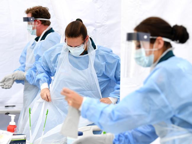 BRISBANE, AUSTRALIA - NewsWire Photos - SEPTEMBER 15, 2020Ambulance officers prepare to preform COVID-19 tests at a testing station operated by paramedics from the Queensland Ambulance Service, in Redbank Pains, southwest of Brisbane. Picture: NCA NewsWire / Dan Peled