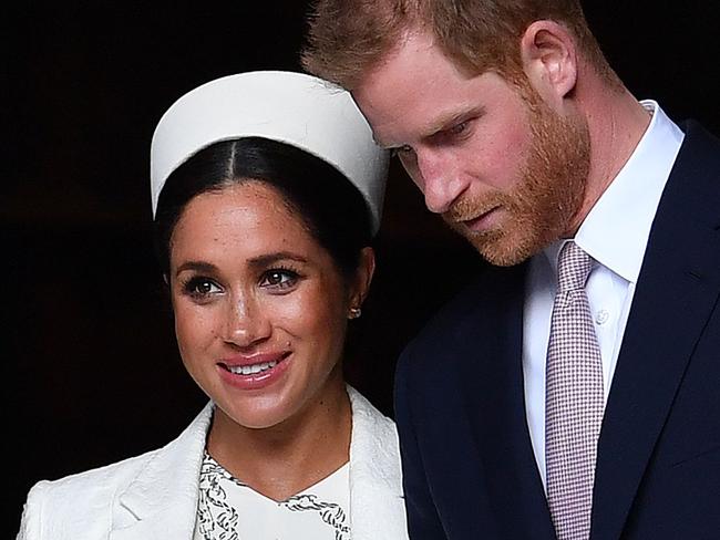 (FILES) In this file photo taken on March 11, 2019 Britain's Prince Harry, Duke of Sussex (R) and Meghan, Duchess of Sussex leave after attending a Commonwealth Day Service at Westminster Abbey in central London. - Talk about being born with a silver spoon in your mouth: the royal baby of Prince Harry and Meghan Markle will have a particularly glittery one. And US tax authorities will be keen to know how much that utensil is worth. That's because the baby will have dual nationality: British because of his father and US from his American mother, whose official title is the duchess of Sussex. US nationality comes with a bevy of restrictive conditions: like any American who is born, grows up and dies anywhere in the world, year after year Meghan and Harry's child will have to show the Internal Revenue Service his or her tax status is clean. (Photo by Ben STANSALL / AFP)