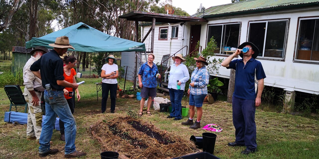 Coming together from Elsmere, Murgon, Nanango, Kingaroy and Wattle Camp, Tee’s Homegrown community working bees are pictured here building a ‘no dig lasagne’ garden with planted seedlings for a Murgon based homeowner.