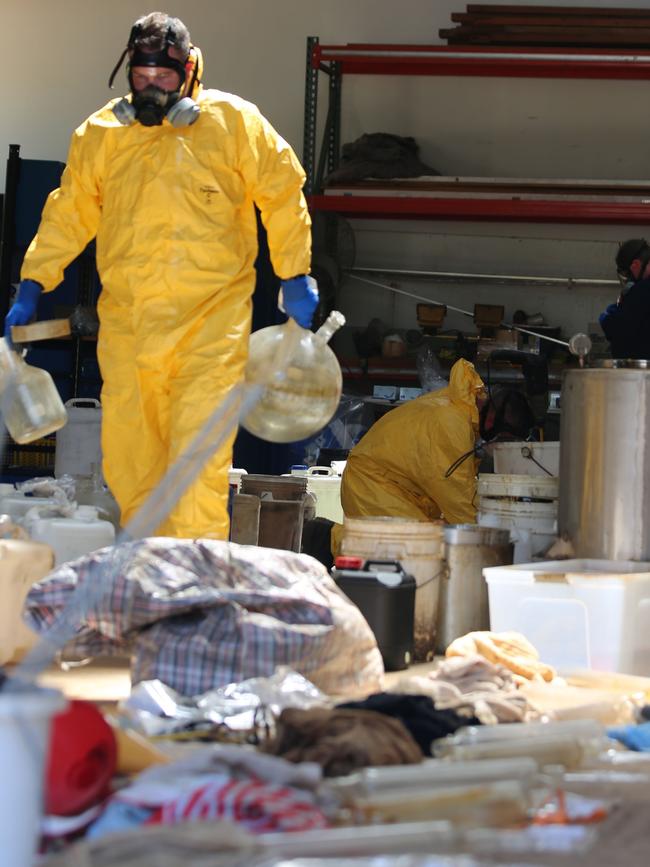 Forensics officers sifting through the Mt Hunter drug lab. Picture: NSW Police