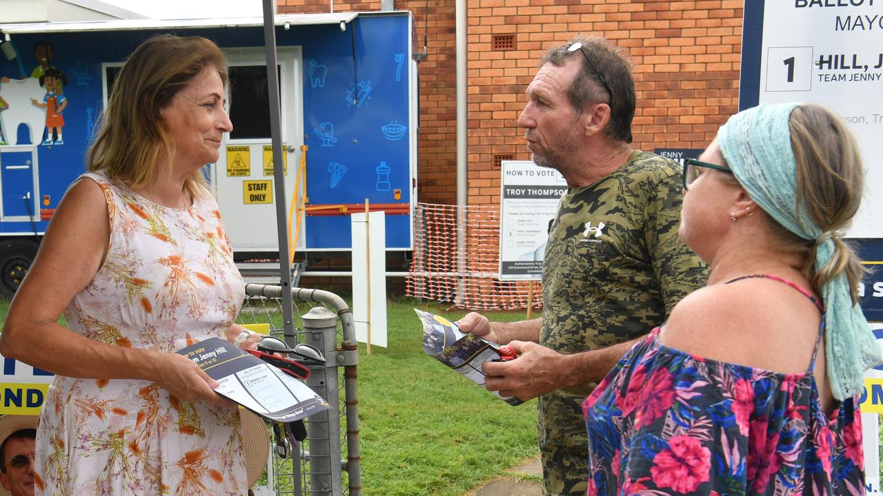 Incumbent mayor Jenny Hill hands out how-to-vote cards at Railway Estate School on election day. Picture: Evan Morgan