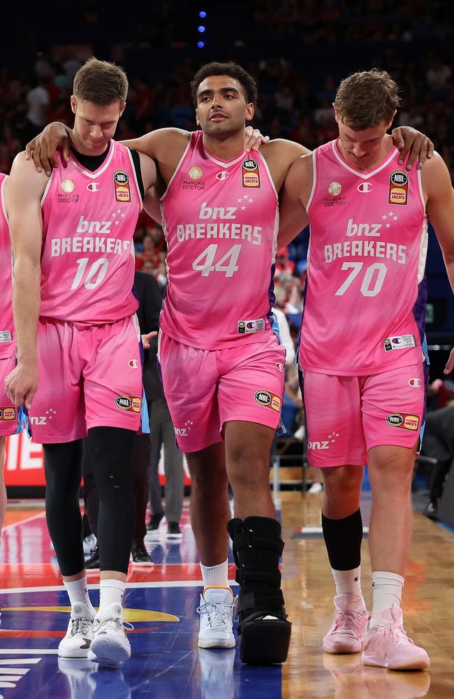 Anthony Lamb of the Breakers is assisted from the court. Picture: Paul Kane/Getty Images