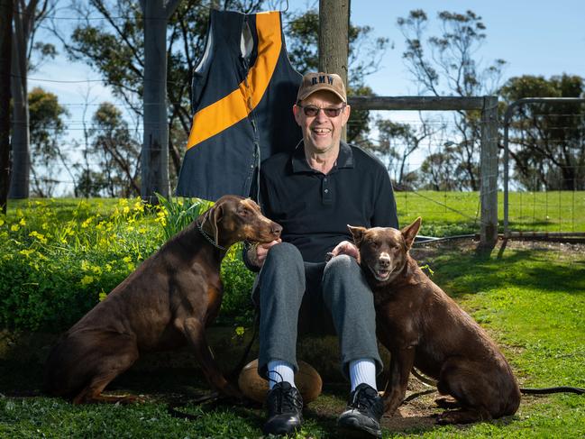 Darrell Moss with his dogs Proby and Swag. Picture: Brad Fleet