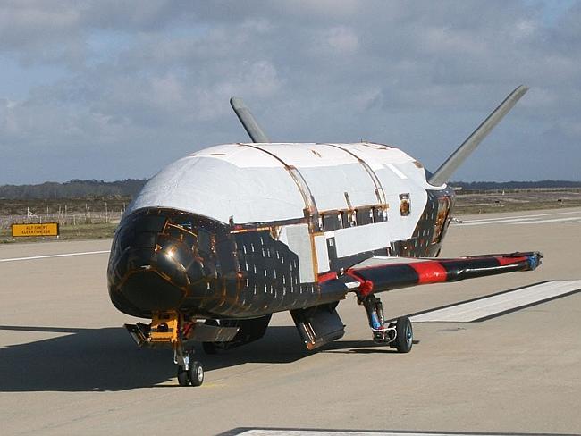 Robot school ... the X-37B Orbital Test Vehicle undergoes testing at the Astrotech facility in Titusville, Florida, in 2010.