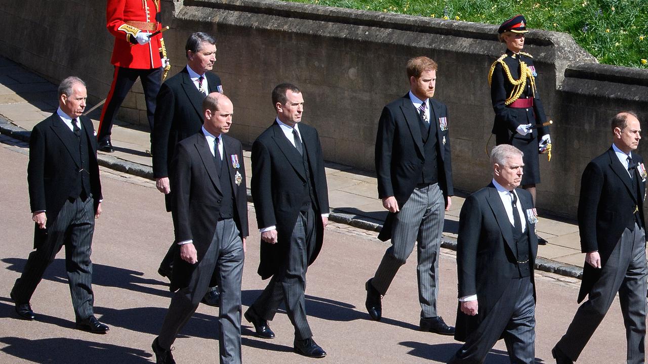 Peter Phillips walks between Prince William and Prince Harry following the funeral. Picture: Leon Neal/Getty Images