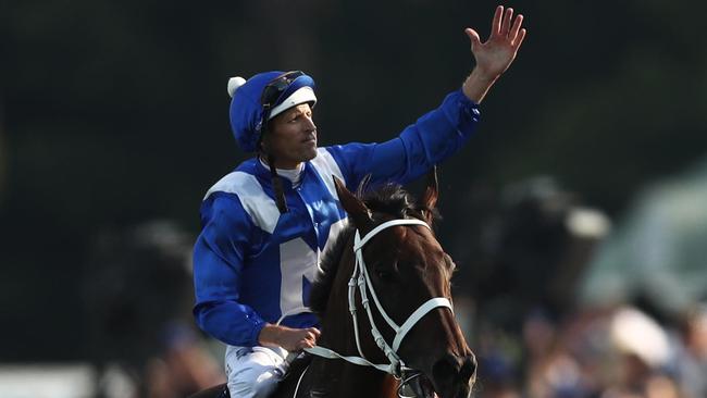 SYDNEY, AUSTRALIA - APRIL 13: Hugh Bowman riding Winx celebrates as he returns to scale after winning race 7 the Longines Queen Elizabeth Stakes during The Championships Day 2 at Royal Randwick Racecourse on April 13, 2019 in Sydney, Australia. (Photo by Mark Metcalfe/Getty Images)