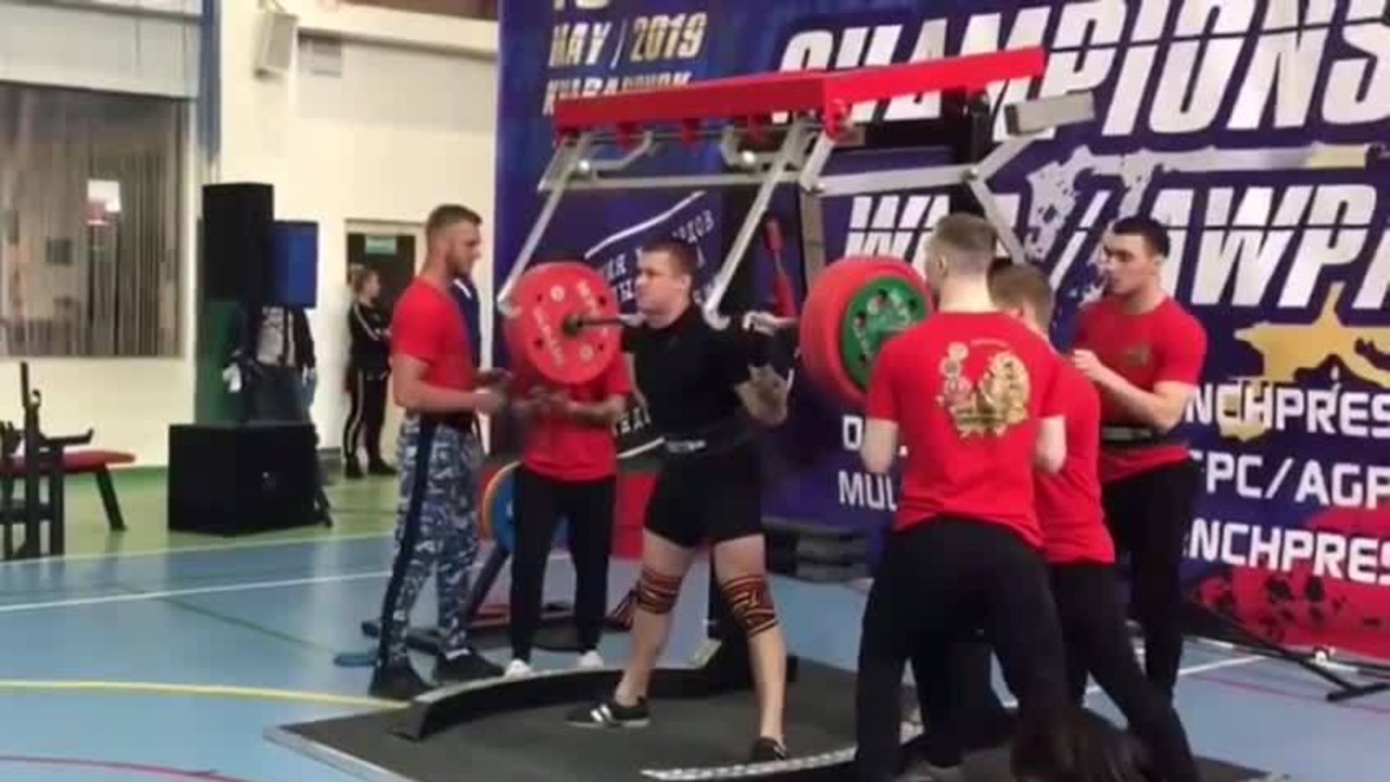 Russian powerlifter Yaroslav Radoshkevich prepares for his third attempt at lifting 250kg at the Eurasian Championship.