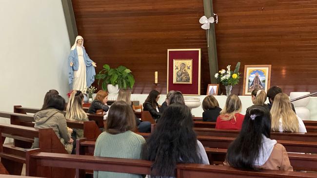 Gold Coast Brazilian group hold prayers at Calvary Catholic Church for Bazillian national Ivan Susin Photo: Steve Holland