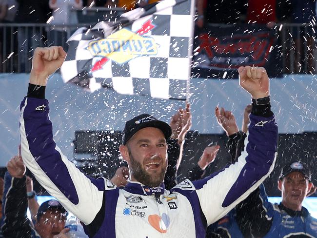 Shane van Gisbergen celebrates after his NASCAR Cup series win on debut at the Chicago Street Course.