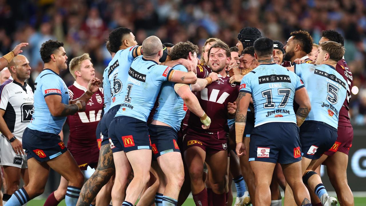 Liam Martin (centre) scuffles with Pat Carrigan during game two of the 2024 Origin series. Picture: Getty Images