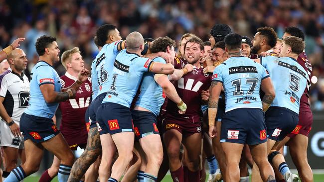 Liam Martin (centre) scuffles with Pat Carrigan during game two of the 2024 Origin series. Picture: Getty Images