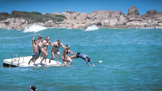 Kids enjoying the temporary pontoon at Horseshoe Bay in summer 2025. Picture: Dean Martin