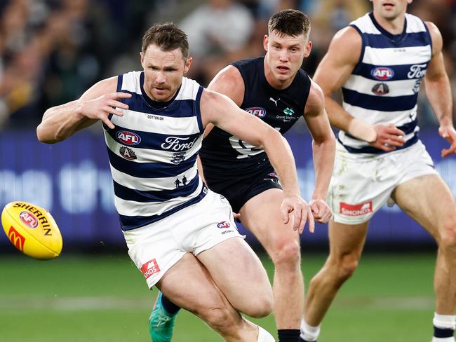 MELBOURNE, AUSTRALIA - APRIL 27: Patrick Dangerfield of the Cats and Sam Walsh of the Blues in action during the 2024 AFL Round 07 match between the Geelong Cats and the Carlton Blues at the Melbourne Cricket Ground on April 27, 2024 in Melbourne, Australia. (Photo by Michael Willson/AFL Photos via Getty Images)