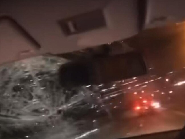 A screen grab from the video showing the damage done to the windscreen of the car.