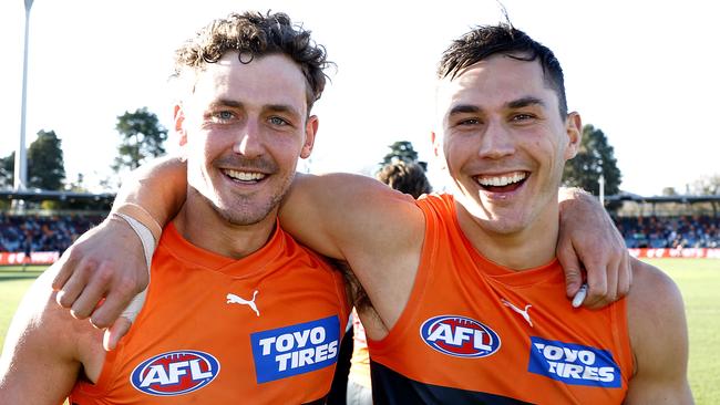 Harry Perryman in his 100th game with Isaac Cumming after the win during the AFL Round 19 match between the GWS Giants and Gold Coast Suns at Manuka oval, Canberra on July 22, 2023. Photo by Phil Hillyard(Image Supplied for Editorial Use only - **NO ON SALES** - Â©Phil Hillyard )