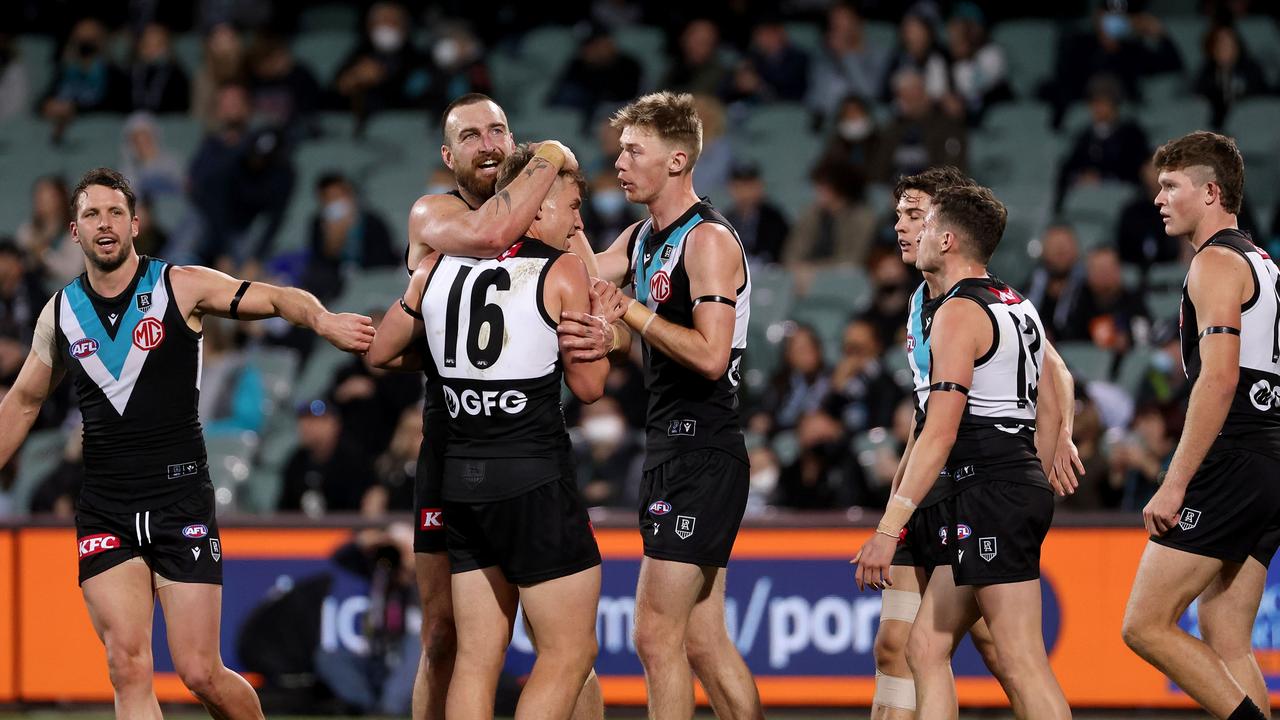 Charlie Dixon and Ollie Wines enjoy a Power goal.