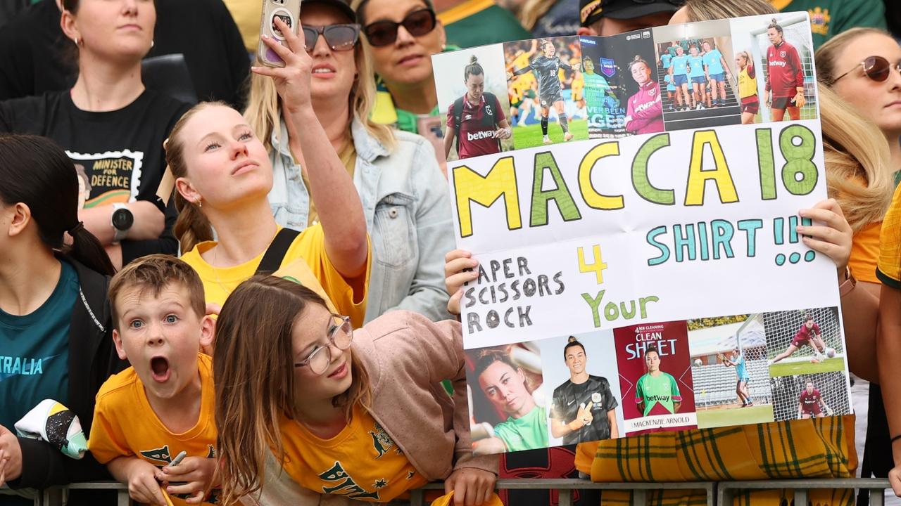 Matildas fans with their signs. (Photo by Will Russell/Getty Images)