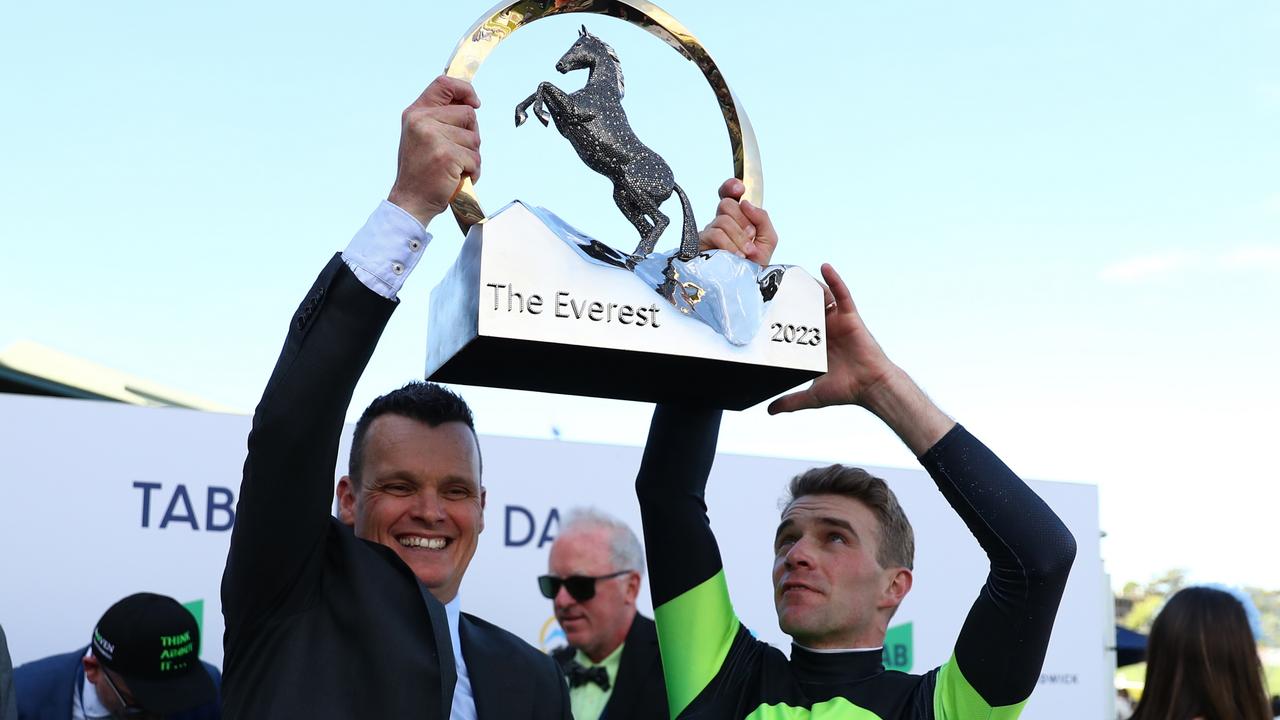 Clipperton lifts The Everest trophy with trainer Joe Pride. Picture: Jeremy Ng/Getty Images