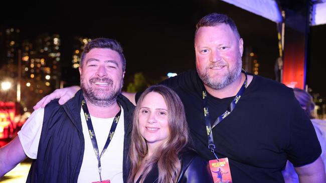 Tom Tipper, Annie Tipper and Stacey Young at the Out 2 Lunch Festival 2025 on Saturday at Broadwater Parklands Southport for Gold Coast at Large. Picture, Portia Large.