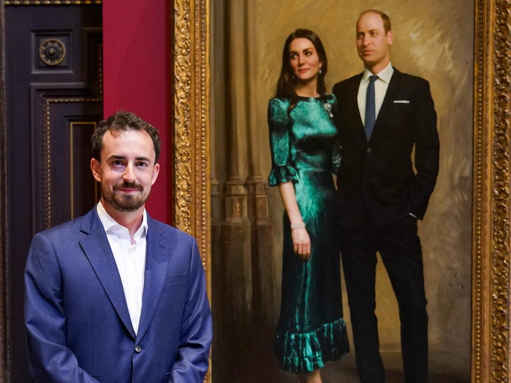 British artist Jamie Coreth poses with his painting of Prince William and Kate Middleton unveiled at the Fitzwilliam Museum in Cambridge. Picture: AFP