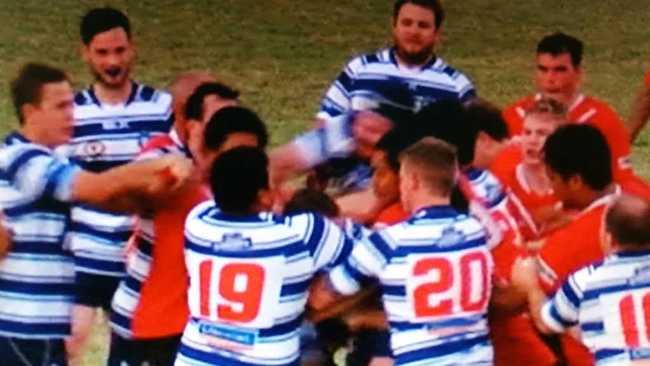 CAUGHT ON CAMERA: Players from Colts and Brothers A-grade teams throw punches as a big brawl unfolds after their game on Anzac Day. PHOTO COURTESY: CHANNEL 7 ROCKHAMPTON