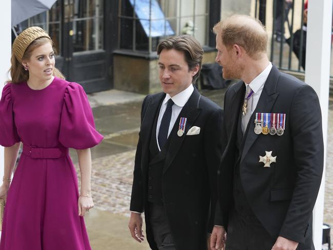 Prince Harry arrives with Princess Beatrice and Edoardo Mapelli Mozzi ahead of the Coronation of King Charles III and Queen Camilla on May 6, 2023. Photo: Getty Images.