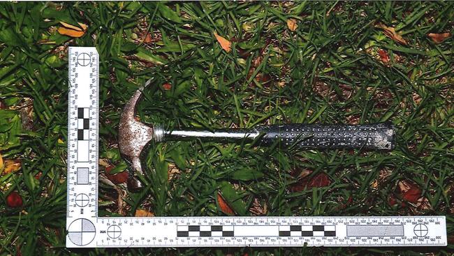 Police photos from the Cobby crime scene including the hammer believed to be used to attack Kym Cobby. Photo Supplied by QLD Police.