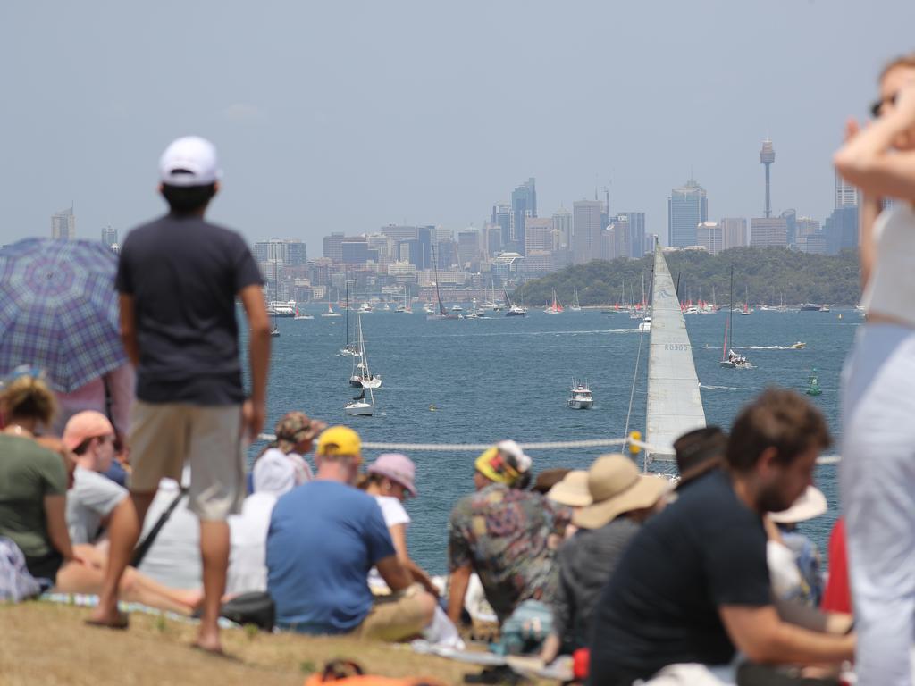 Crowds gather near Hornby Lighthouse on South Head before the start of the race. 2019 Sydney to Hobart Crowds watching the race as the Yachts pass through the heads. Picture: Rohan Kelly