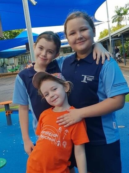 Pippa’s first day of school at Larrakeyah Primary with big sister Mia Robinson and Nina Ganley Picture: ALEXA GUTENBERGER
