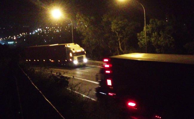 Flood-diverted heavy vehicles are causing late night chaos on Lismore's Bruxner Highway.