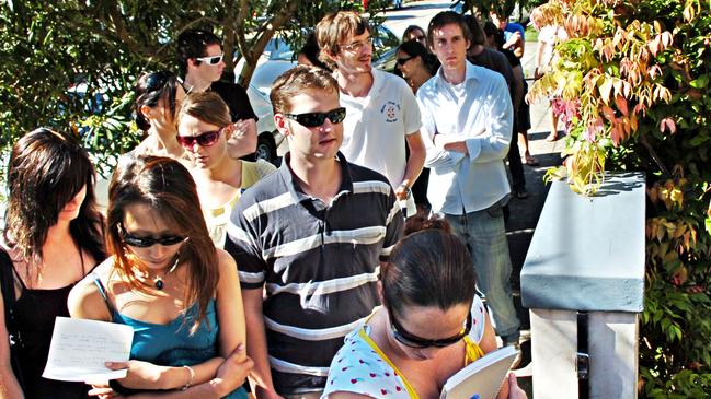 Tenants lining up to rent an apartment in Lewisham.