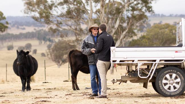 AgriWebb's John Fargher with Bucki Pastoral farm manager Stuart White at Henty, NSW.