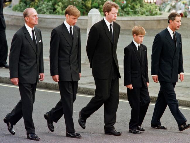 The image that broke the world’s heart - Prince William and Prince Harry walk behind their mother’s coffin. Picture: AFP