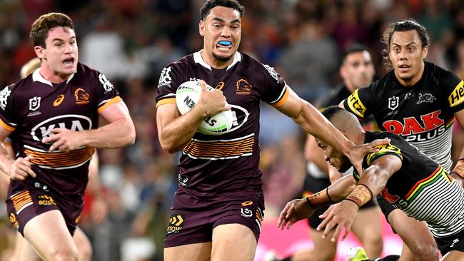 Xavier Coates breaks through the Panthers defence as the Broncos put on a spirited display. Picture: Getty Images