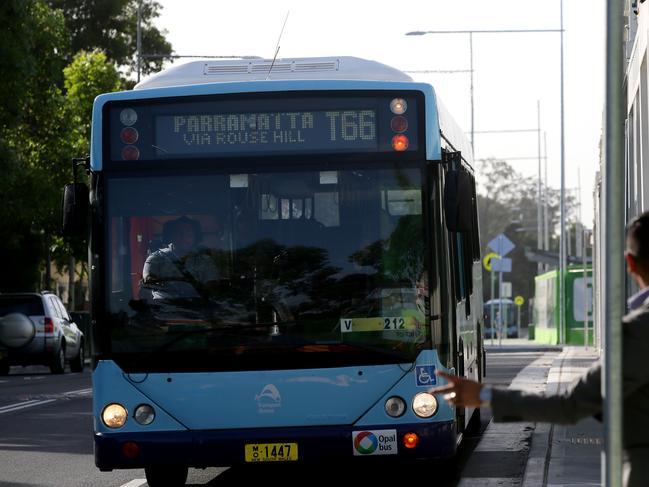 Generic pictures of buses at the  bus stop on Market Lane at the Rouse Hill Town Centre.